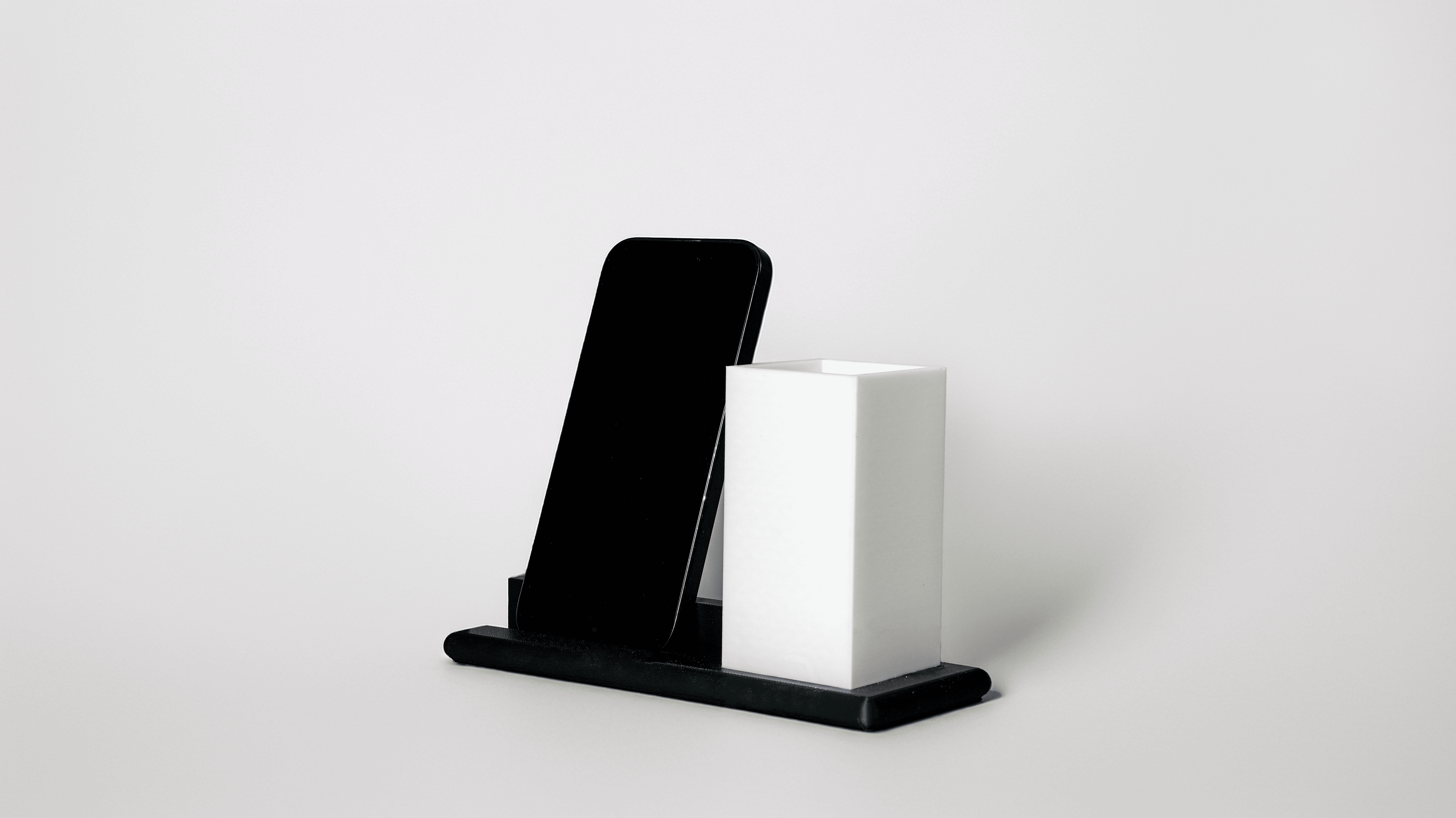 Support de téléphone avec porte stylo