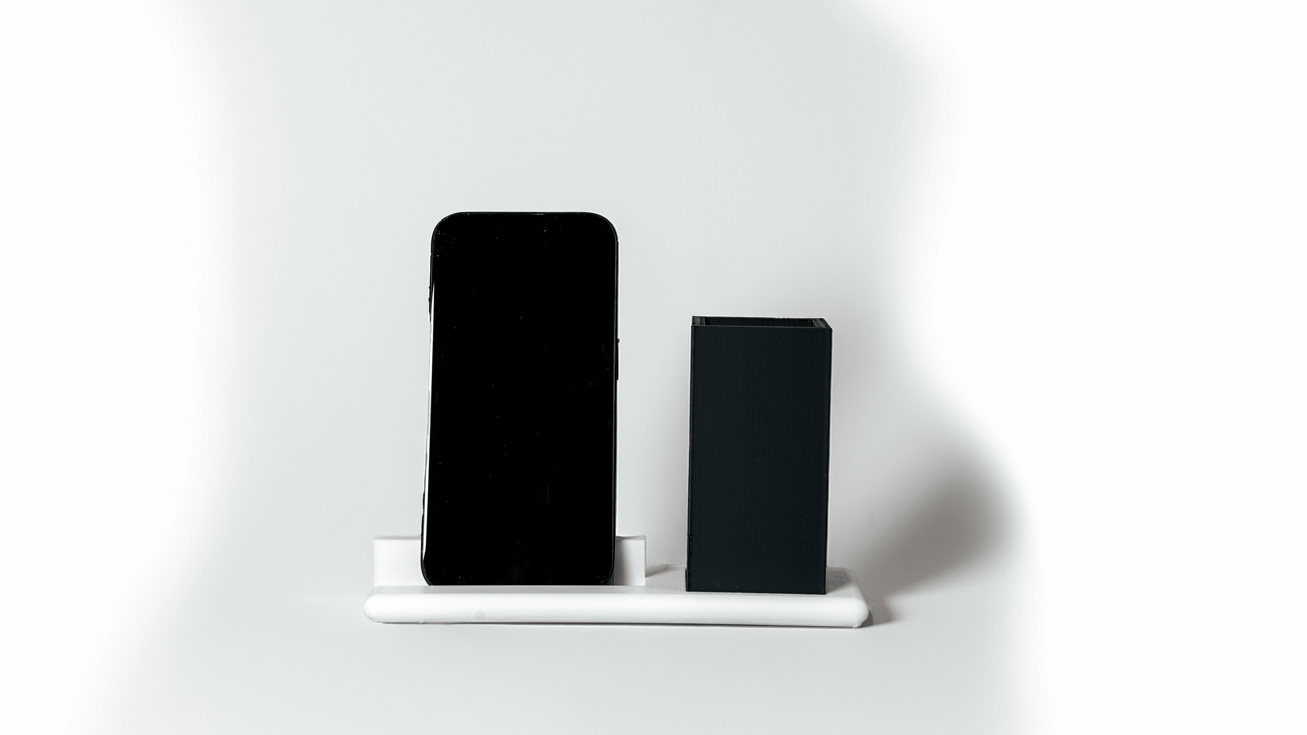 Support de téléphone avec porte stylo