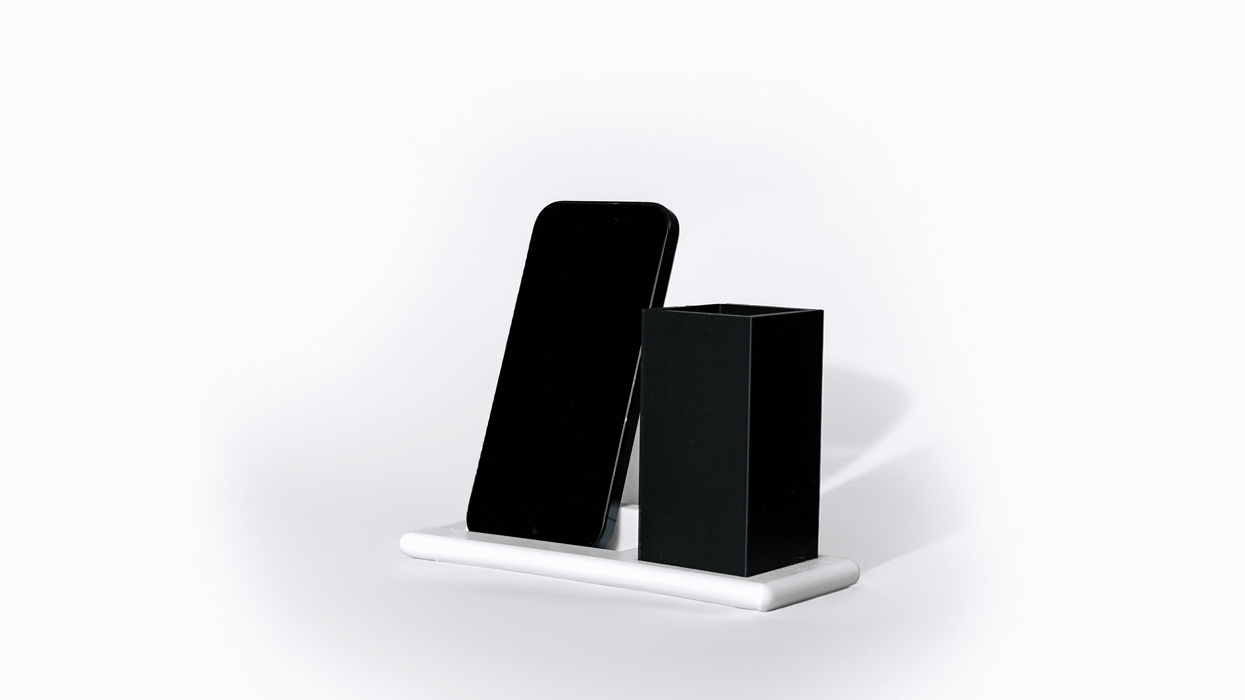 Support de téléphone avec porte stylo